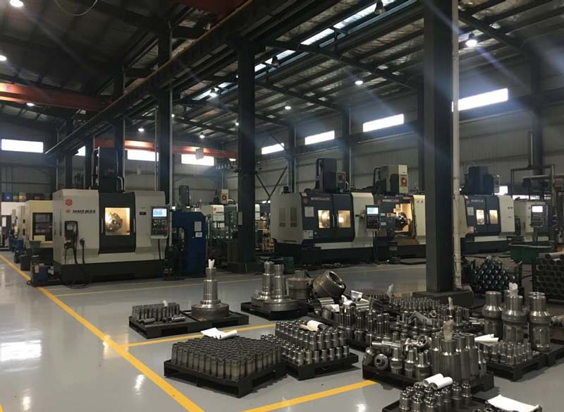1780281284714346.jpg modern-MSD-DTH-hammer-and-button-bit-on-factory-workshop-table-showing-current-DTH-drilling-technology.jpg