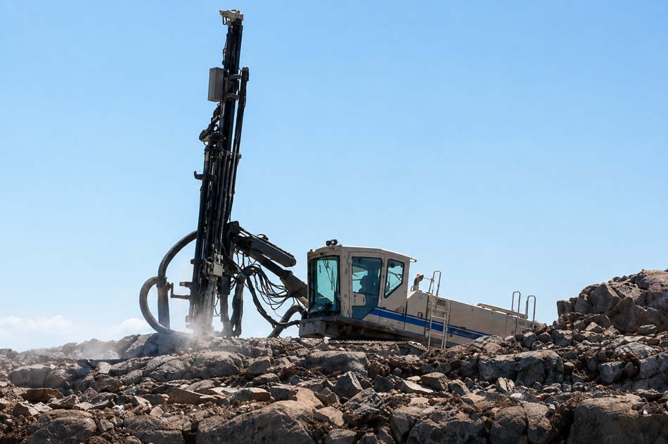 1780390862819265.jpg drilling-methods-overview-showing-DTH-percussion-drilling-rig-operating-on-hard-rock-site.jpg
