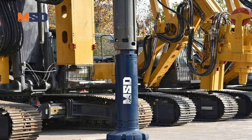 1781765953162088.jpg down-the-hole-hammer-piling-setup-with-DTH-hammer-installed-inside-steel-pile-on-construction-site.jpg