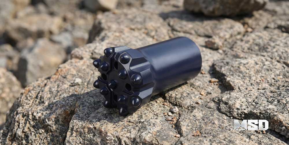 MSD-thread-button-bit-sharp-carbide-buttons-full-protrusion-before-drilling.jpg